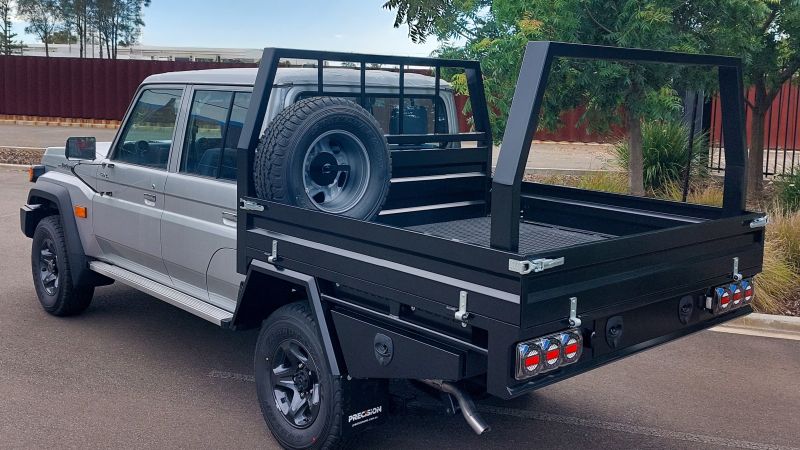 Heavy Duty Steel Tray DC Landcruiser 79 Series with wheel mount and rear load rack and toolboxes