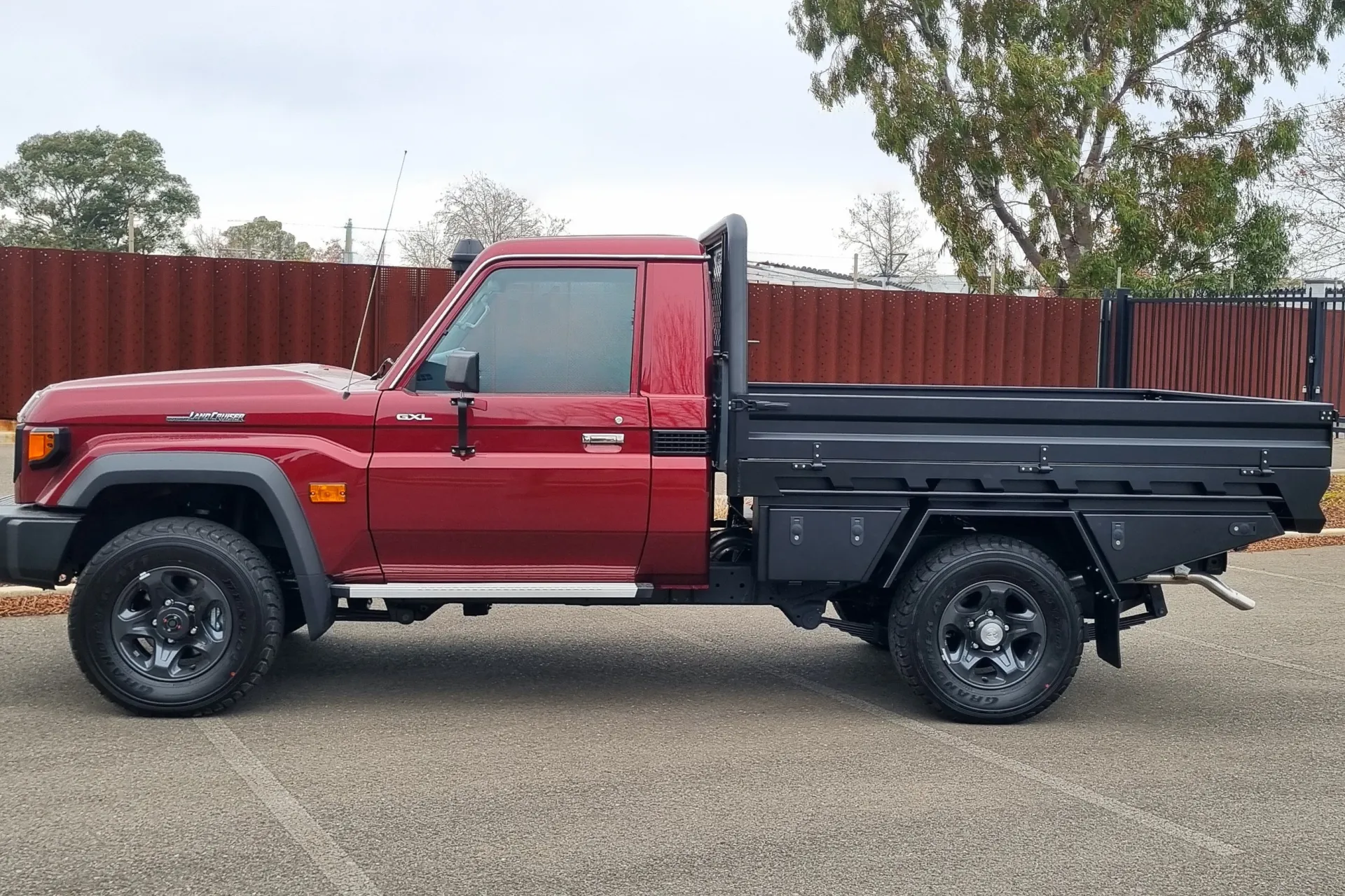 Aluminium Tray Single Cab Toyota Landcruiser 79 Series on maroon ute with black aluminium tray with double toolboxes